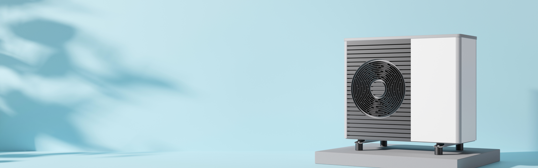 A modern heat pump unit with a black circular fan stands on a platform against a light blue background.