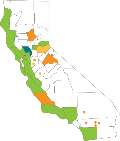 Map of California with counties colored green, orange, and blue, illustrating various California electricity options; most counties uncolored.